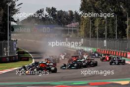 Max Verstappen (NLD) Red Bull Racing RB16B leads at the start of the race. 07.11.2021. Formula 1 World Championship, Rd 18, Mexican Grand Prix, Mexico City, Mexico, Race Day.