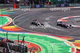 Nikita Mazepin (RUS) Haas F1 Team VF-21 and Antonio Giovinazzi (ITA) Alfa Romeo Racing C41. 06.11.2021. Formula 1 World Championship, Rd 18, Mexican Grand Prix, Mexico City, Mexico, Qualifying Day.