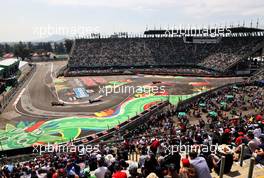 Antonio Giovinazzi (ITA) Alfa Romeo Racing C41 and Daniel Ricciardo (AUS) McLaren MCL35M. 06.11.2021. Formula 1 World Championship, Rd 18, Mexican Grand Prix, Mexico City, Mexico, Qualifying Day.