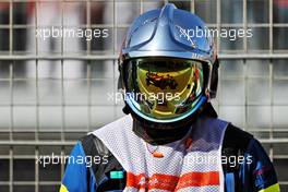 Lando Norris (GBR) McLaren MCL35M reflected in a marshal's visor. 03.09.2021. Formula 1 World Championship, Rd 13, Dutch Grand Prix, Zandvoort, Netherlands, Practice Day.