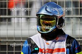 Daniel Ricciardo (AUS) McLaren MCL35M reflected in a marshal's visor. 03.09.2021. Formula 1 World Championship, Rd 13, Dutch Grand Prix, Zandvoort, Netherlands, Practice Day.