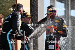The podium (L to R): second placed Lewis Hamilton (GBR) Mercedes AMG F1 celebrates with third placed Valtteri Bottas (FIN) Mercedes AMG F1 and race winner Max Verstappen (NLD) Red Bull Racing. 05.09.2021. Formula 1 World Championship, Rd 13, Dutch Grand Prix, Zandvoort, Netherlands, Race Day.