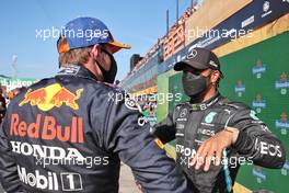 (L to R): Race winner Max Verstappen (NLD) Red Bull Racing with Lewis Hamilton (GBR) Mercedes AMG F1 in parc ferme. 05.09.2021. Formula 1 World Championship, Rd 13, Dutch Grand Prix, Zandvoort, Netherlands, Race Day.