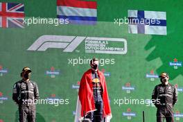 The podium (L to R): Lewis Hamilton (GBR) Mercedes AMG F1, second; Max Verstappen (NLD) Red Bull Racing, race winner; Valtteri Bottas (FIN) Mercedes AMG F1, third. 05.09.2021. Formula 1 World Championship, Rd 13, Dutch Grand Prix, Zandvoort, Netherlands, Race Day.