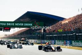 (L to R): Lewis Hamilton (GBR) Mercedes AMG F1 W12 and Max Verstappen (NLD) Red Bull Racing RB16B at the start of the race. 05.09.2021. Formula 1 World Championship, Rd 13, Dutch Grand Prix, Zandvoort, Netherlands, Race Day.