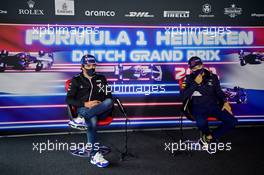 (L to R): Fernando Alonso (ESP) Alpine F1 Team and Sergio Perez (MEX) Red Bull Racing in the FIA Press Conference. 02.09.2021. Formula 1 World Championship, Rd 13, Dutch Grand Prix, Zandvoort, Netherlands, Preparation Day.