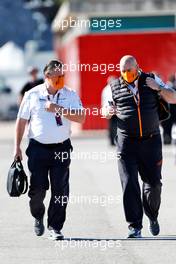 (L to R): Zak Brown (USA) McLaren Executive Director with Tim Bampton (GBR) McLaren Head of Communications. 30.04.2021. Formula 1 World Championship, Rd 3, Portuguese Grand Prix, Portimao, Portugal, Practice Day.