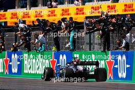Race winner Lewis Hamilton (GBR) Mercedes AMG F1 W12 celebrates with the team at the end of the race. 02.05.2021. Formula 1 World Championship, Rd 3, Portuguese Grand Prix, Portimao, Portugal, Race Day.