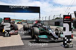 Race winner Lewis Hamilton (GBR) Mercedes AMG F1 W12 in parc ferme. 02.05.2021. Formula 1 World Championship, Rd 3, Portuguese Grand Prix, Portimao, Portugal, Race Day.