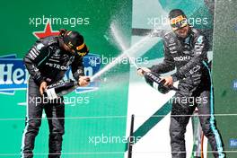 (L to R): Race winner Lewis Hamilton (GBR) Mercedes AMG F1 celebrates on the podium with third placed team mate Valtteri Bottas (FIN) Mercedes AMG F1. 02.05.2021. Formula 1 World Championship, Rd 3, Portuguese Grand Prix, Portimao, Portugal, Race Day.
