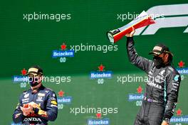 Race winner Lewis Hamilton (GBR) Mercedes AMG F1 (Right) celebrates on the podium alongside second placed Max Verstappen (NLD) Red Bull Racing. 02.05.2021. Formula 1 World Championship, Rd 3, Portuguese Grand Prix, Portimao, Portugal, Race Day.