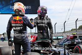 Race winner Lewis Hamilton (GBR) Mercedes AMG F1 W12 celebrates in parc ferme with second placed Max Verstappen (NLD) Red Bull Racing. 02.05.2021. Formula 1 World Championship, Rd 3, Portuguese Grand Prix, Portimao, Portugal, Race Day.