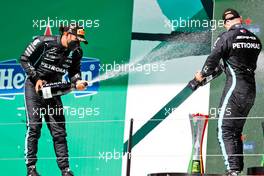 (L to R): race winner Lewis Hamilton (GBR) Mercedes AMG F1 celebrates on the podium with third placed team mate Valtteri Bottas (FIN) Mercedes AMG F1. 02.05.2021. Formula 1 World Championship, Rd 3, Portuguese Grand Prix, Portimao, Portugal, Race Day.