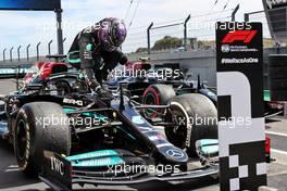 Race winner Lewis Hamilton (GBR) Mercedes AMG F1 W12 celebrates in parc ferme. 02.05.2021. Formula 1 World Championship, Rd 3, Portuguese Grand Prix, Portimao, Portugal, Race Day.