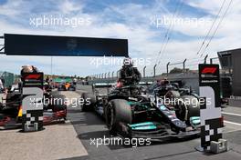 Race winner Lewis Hamilton (GBR) Mercedes AMG F1 W12 in parc ferme with second placed Max Verstappen (NLD) Red Bull Racing RB16B. 02.05.2021. Formula 1 World Championship, Rd 3, Portuguese Grand Prix, Portimao, Portugal, Race Day.