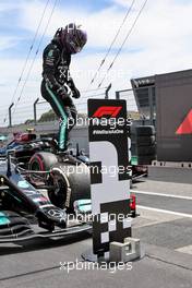 Race winner Lewis Hamilton (GBR) Mercedes AMG F1 W12 in parc ferme. 02.05.2021. Formula 1 World Championship, Rd 3, Portuguese Grand Prix, Portimao, Portugal, Race Day.