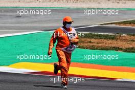 Circuit atmosphere - a marshal. 02.05.2021. Formula 1 World Championship, Rd 3, Portuguese Grand Prix, Portimao, Portugal, Race Day.