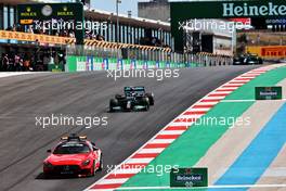 Valtteri Bottas (FIN) Mercedes AMG F1 W12 leads behind the Mercedes FIA Safety Car. 02.05.2021. Formula 1 World Championship, Rd 3, Portuguese Grand Prix, Portimao, Portugal, Race Day.