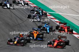 (L to R): Sergio Perez (MEX) Red Bull Racing RB16B and Carlos Sainz Jr (ESP) Ferrari SF-21. 02.05.2021. Formula 1 World Championship, Rd 3, Portuguese Grand Prix, Portimao, Portugal, Race Day.