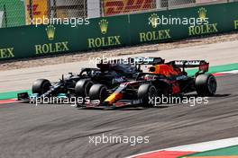 Max Verstappen (NLD) Red Bull Racing RB16B and Valtteri Bottas (FIN) Mercedes AMG F1 W12 battle for position. 02.05.2021. Formula 1 World Championship, Rd 3, Portuguese Grand Prix, Portimao, Portugal, Race Day.