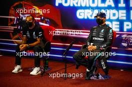 (L to R): Lewis Hamilton (GBR) Mercedes AMG F1 and team mate Valtteri Bottas (FIN) Mercedes AMG F1 in the post qualifying FIA Press Conference. 01.05.2021. Formula 1 World Championship, Rd 3, Portuguese Grand Prix, Portimao, Portugal, Qualifying Day.