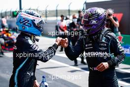 (L to R): Valtteri Bottas (FIN) Mercedes AMG F1 celebrates his pole position in qualifying parc ferme with second placed team mate Lewis Hamilton (GBR) Mercedes AMG F1. 01.05.2021. Formula 1 World Championship, Rd 3, Portuguese Grand Prix, Portimao, Portugal, Qualifying Day.