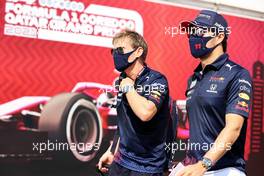 Sergio Perez (MEX) Red Bull Racing (Right) with Xavi Martos (ESP) Red Bull Racing F1 Team Physio. 19.11.2021 Formula 1 World Championship, Rd 20, Qatar Grand Prix, Doha, Qatar, Practice Day.