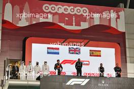 The podium (L to R): Max Verstappen (NLD) Red Bull Racing, second; Lewis Hamilton (GBR) Mercedes AMG F1, race winner; Fernando Alonso (ESP) Alpine F1 Team, third. 21.11.2021. Formula 1 World Championship, Rd 20, Qatar Grand Prix, Doha, Qatar, Race Day.