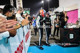 Third placed Fernando Alonso (ESP) Alpine F1 Team celebrates with team mate Esteban Ocon (FRA) Alpine F1 Team in parc ferme. 21.11.2021. Formula 1 World Championship, Rd 20, Qatar Grand Prix, Doha, Qatar, Race Day.