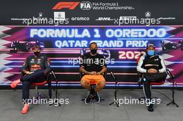 (L to R): Max Verstappen (NLD) Red Bull Racing; Lewis Hamilton (GBR) Mercedes AMG F1; and Fernando Alonso (ESP) Alpine F1 Team, in the post race FIA Press Conference. 21.11.2021. Formula 1 World Championship, Rd 20, Qatar Grand Prix, Doha, Qatar, Race Day.