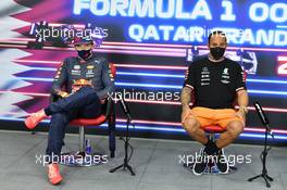 (L to R): Max Verstappen (NLD) Red Bull Racing and Lewis Hamilton (GBR) Mercedes AMG F1 in the post race FIA Press Conference. 21.11.2021. Formula 1 World Championship, Rd 20, Qatar Grand Prix, Doha, Qatar, Race Day.