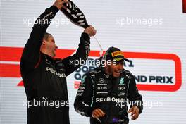 Race winner Lewis Hamilton (GBR) Mercedes AMG F1 celebrates on the podium. 21.11.2021. Formula 1 World Championship, Rd 20, Qatar Grand Prix, Doha, Qatar, Race Day.