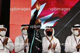 Race winner Lewis Hamilton (GBR) Mercedes AMG F1 celebrates on the podium. 21.11.2021. Formula 1 World Championship, Rd 20, Qatar Grand Prix, Doha, Qatar, Race Day.