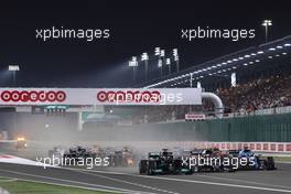 (L to R): Lewis Hamilton (GBR) Mercedes AMG F1 W12 leads at the start of the race with Pierre Gasly (FRA) AlphaTauri AT02 and Fernando Alonso (ESP) Alpine F1 Team A521. 21.11.2021. Formula 1 World Championship, Rd 20, Qatar Grand Prix, Doha, Qatar, Race Day.