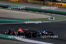 Sergio Perez (MEX) Red Bull Racing RB16B battles for position with Charles Leclerc (MON) Ferrari SF-21 and Fernando Alonso (ESP) Alpine F1 Team A521. 21.11.2021. Formula 1 World Championship, Rd 20, Qatar Grand Prix, Doha, Qatar, Race Day.