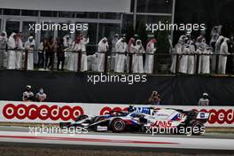 Nicholas Latifi (CDN) Williams Racing FW43B and Mick Schumacher (GER) Haas VF-21 battle for position. 21.11.2021. Formula 1 World Championship, Rd 20, Qatar Grand Prix, Doha, Qatar, Race Day.