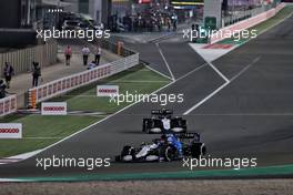 Nicholas Latifi (CDN) Williams Racing FW43B leaves the pits behind team mate George Russell (GBR) Williams Racing FW43B. 21.11.2021. Formula 1 World Championship, Rd 20, Qatar Grand Prix, Doha, Qatar, Race Day.