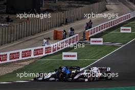 Nicholas Latifi (CDN) Williams Racing FW43B and Mick Schumacher (GER) Haas VF-21 battle for position. 21.11.2021. Formula 1 World Championship, Rd 20, Qatar Grand Prix, Doha, Qatar, Race Day.