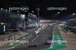 Max Verstappen (NLD) Red Bull Racing RB16B passes Fernando Alonso (ESP) Alpine F1 Team A521. 21.11.2021. Formula 1 World Championship, Rd 20, Qatar Grand Prix, Doha, Qatar, Race Day.