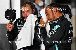 Pole sitter Lewis Hamilton (GBR) Mercedes AMG F1 and team mate Valtteri Bottas (FIN) Mercedes AMG F1 in qualifying parc ferme. 20.11.2021. Formula 1 World Championship, Rd 20, Qatar Grand Prix, Doha, Qatar, Qualifying Day.