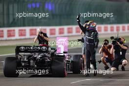 Lewis Hamilton (GBR) Mercedes AMG F1 W12 celebrates his pole position in qualifying parc ferme. 20.11.2021. Formula 1 World Championship, Rd 20, Qatar Grand Prix, Doha, Qatar, Qualifying Day.