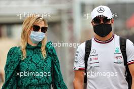 (L to R): Tiffany Cromwell (AUS) Professional Cyclist with her boyfriend Valtteri Bottas (FIN) Mercedes AMG F1. 20.11.2021. Formula 1 World Championship, Rd 20, Qatar Grand Prix, Doha, Qatar, Qualifying Day.