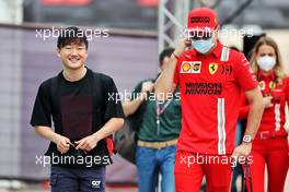 (L to R): Yuki Tsunoda (JPN) AlphaTauri with Charles Leclerc (MON) Ferrari. 20.11.2021. Formula 1 World Championship, Rd 20, Qatar Grand Prix, Doha, Qatar, Qualifying Day.