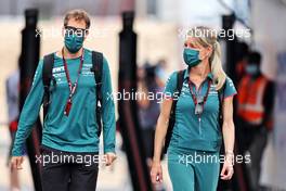 (L to R): Sebastian Vettel (GER) Aston Martin F1 Team with Britta Roeske (AUT) Aston Martin F1 Team Public Relations Manager. 20.11.2021. Formula 1 World Championship, Rd 20, Qatar Grand Prix, Doha, Qatar, Qualifying Day.