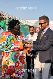 (L to R): Mr Moko (SEN) Crown Hearts Jewelry with David Beckham (GBR) Former Football Player. 21.11.2021. Formula 1 World Championship, Rd 20, Qatar Grand Prix, Doha, Qatar, Race Day.