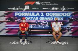 (L to R): Charles Leclerc (MON) Ferrari and Nikita Mazepin (RUS) Haas F1 Team in the FIA Press Conference. 18.11.2021. Formula 1 World Championship, Rd 20, Qatar Grand Prix, Doha, Qatar, Preparation Day.