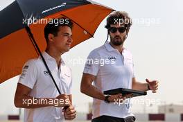 Lando Norris (GBR) McLaren with Jose Manuel Lopez Garcia (ESP) McLaren Lead Performance Engineer. 18.11.2021. Formula 1 World Championship, Rd 20, Qatar Grand Prix, Doha, Qatar, Preparation Day.