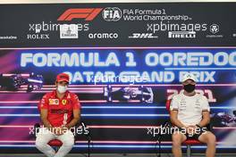(L to R): Carlos Sainz Jr (ESP) Ferrari and Valtteri Bottas (FIN) Mercedes AMG F1 in the FIA Press Conference. 18.11.2021. Formula 1 World Championship, Rd 20, Qatar Grand Prix, Doha, Qatar, Preparation Day.