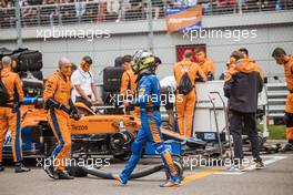 Lando Norris (GBR) McLaren MCL35M on the grid. 26.09.2021. Formula 1 World Championship, Rd 15, Russian Grand Prix, Sochi Autodrom, Sochi, Russia, Race Day.