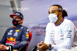 Lewis Hamilton (GBR) Mercedes AMG F1 and Max Verstappen (NLD) Red Bull Racing in the post race FIA Press Conference. 26.09.2021. Formula 1 World Championship, Rd 15, Russian Grand Prix, Sochi Autodrom, Sochi, Russia, Race Day.